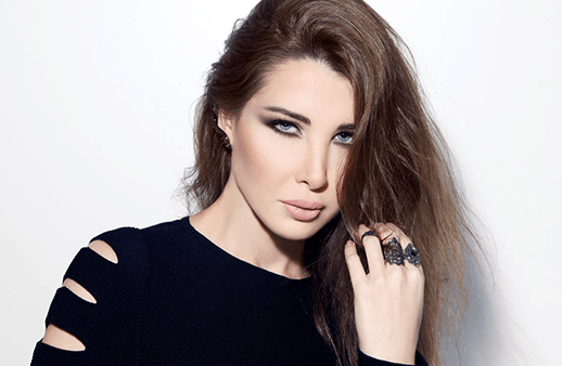 ما هي مفاجأة نانسي عجرم مع تامر حسني؟